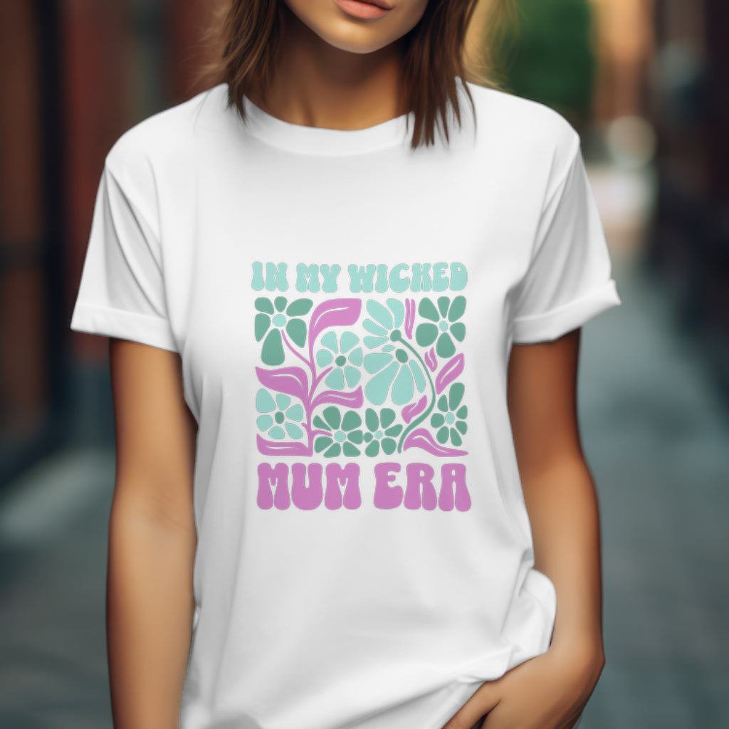 In My Wicked Mum Era Retro Floral T-Shirt, Wicked Defy Gravity Shirt, Wicked Musical Sweater, Wizard of Oz T-shirt, Pink And Green Tee