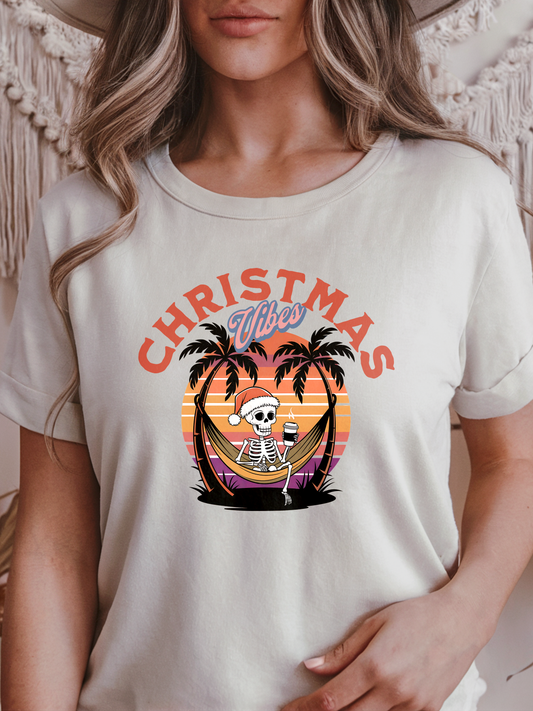 Christmas Vibes Tropical Skeleton in Hammock Graphic T-Shirt